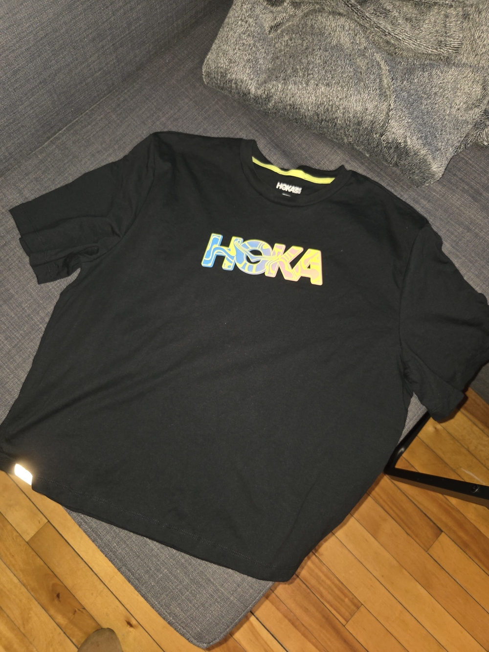 Hoka Black Short Sleeve Tee with Blue and Yellow Logo